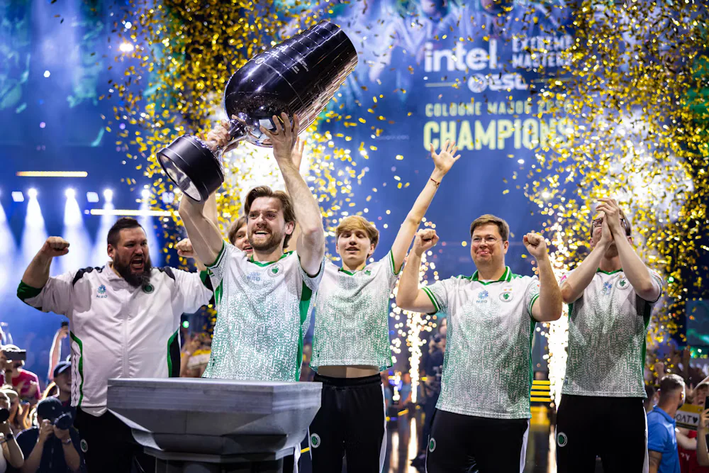 Falcons players lift the IEM Cologne Major 2026 trophy together